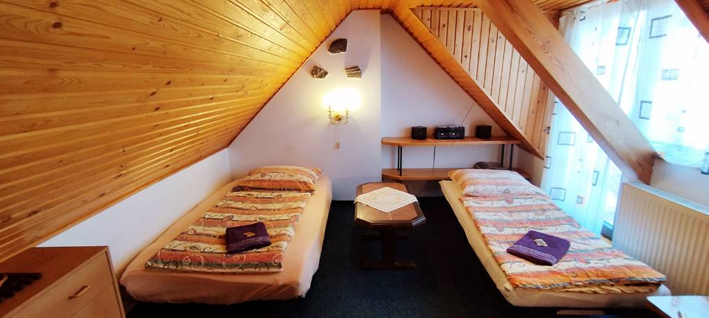 Cottage Lucie - roof rooms, each with bed 140 cm and extra bed. Room with balcony.