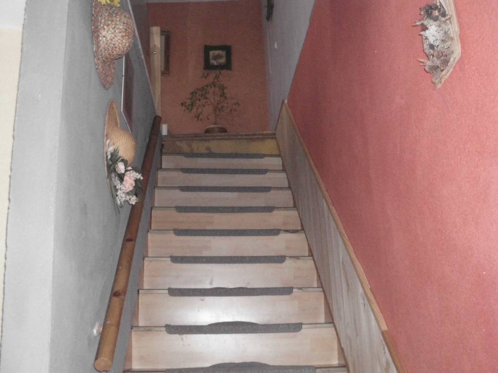 Treppenaufgang in den oberen Bereich