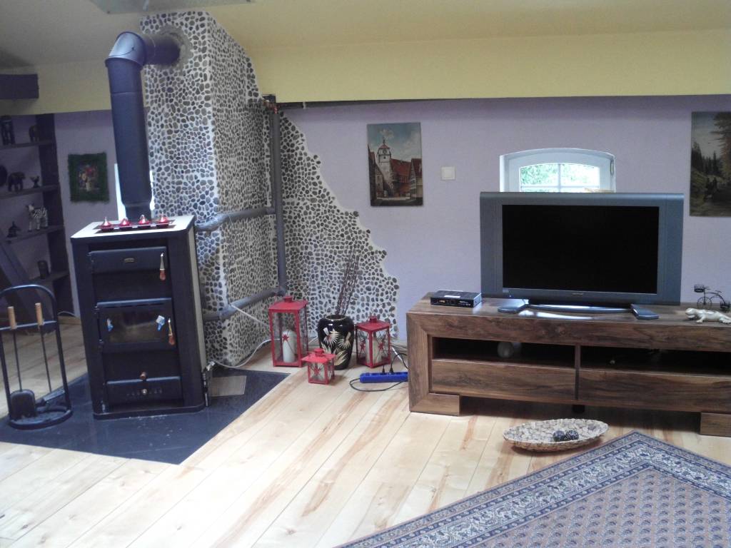 Wohnzimmer mit Kamin