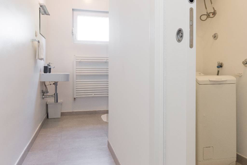 Badezimmer - Zusätzliches Zimmer mit der Waschmaschine